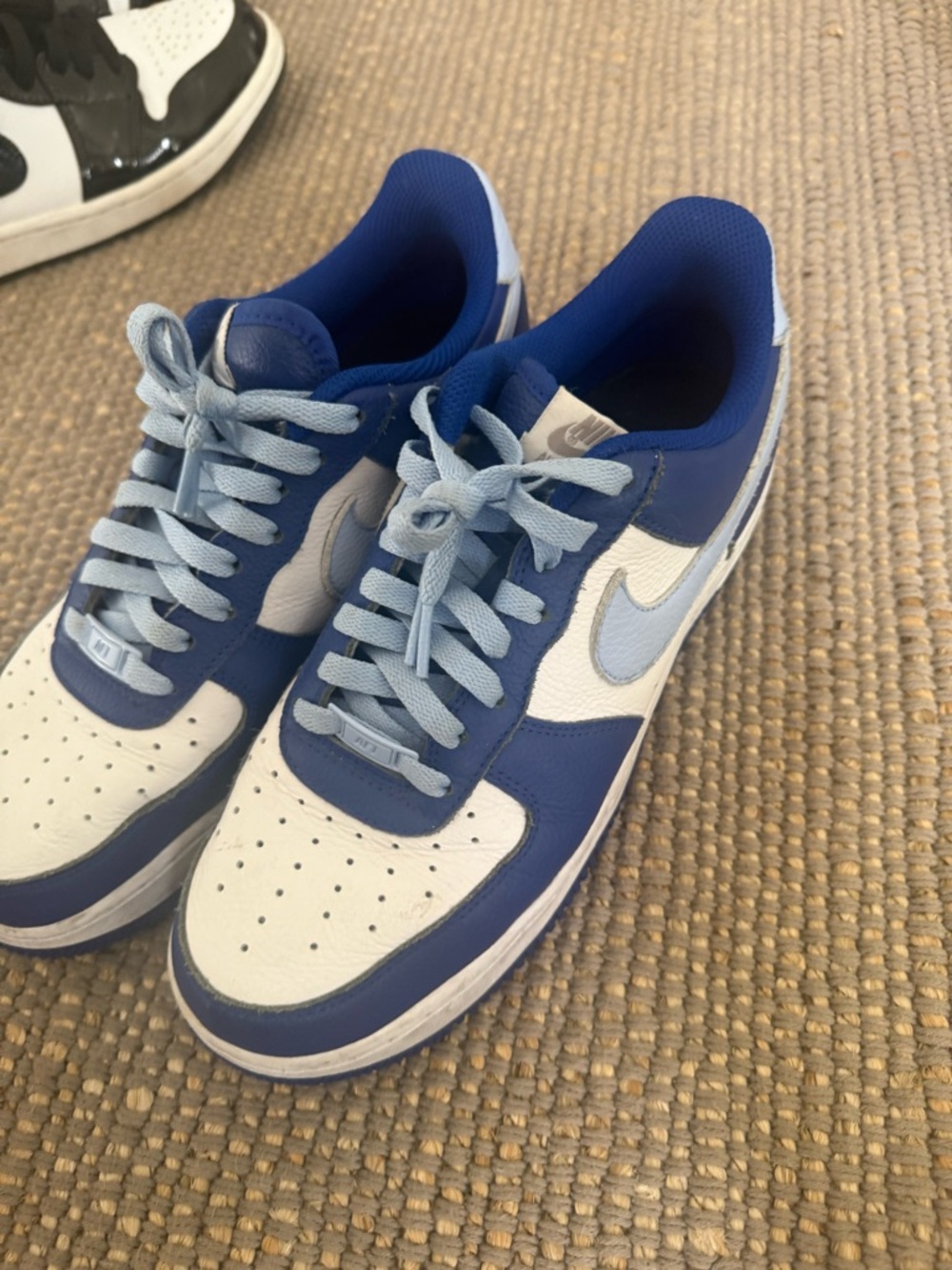 Nike White and Blue Low-Top Sneakers with Light Blue Swoosh